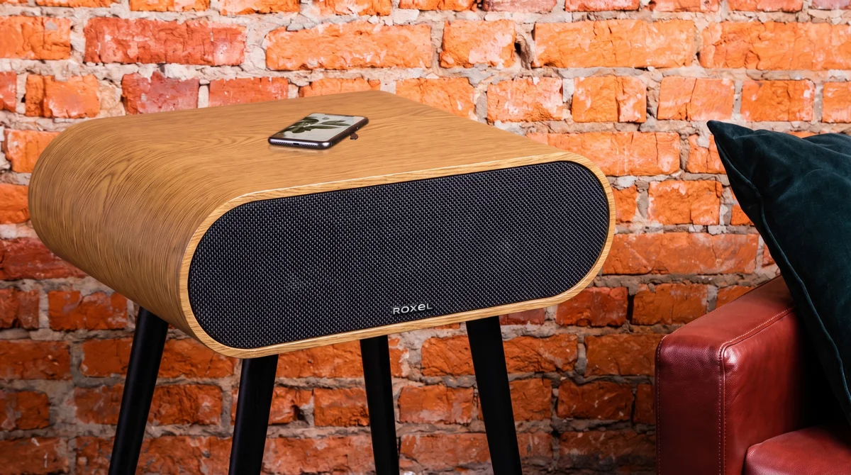 Roxel Jazz Oak Bluetooth speaker table in a warm living room